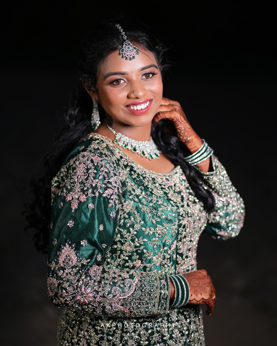 Stunning wedding reception photography of Balaji and Divya at Harsha Mahal, Coimbatore by AK Photography. Beautiful moments captured with elegance and emotion. View the gallery.